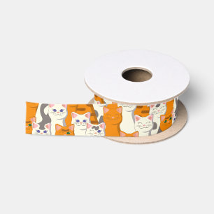 Witte en gember katten patroon groene ogen blauwe satijnen lint