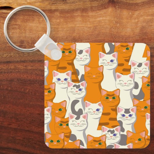 Witte en gember katten patroon groene ogen blauwe  sleutelhanger (Voorkant)