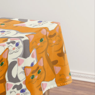 Witte en gember katten patroon groene ogen blauwe tafelkleed