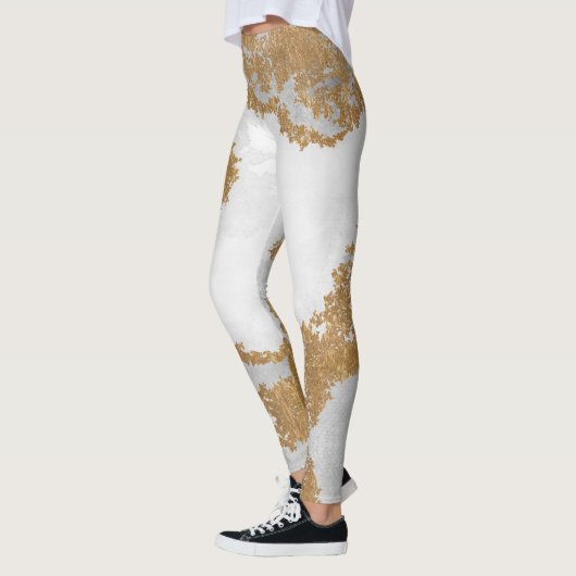 Witte en goudmarmer leggings (Links)