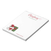 Witte en groene wasdozen met een kersthat notitieblok (Linkerzijde)