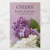 Witte en paarse lilacen op textuur wijn etiket (Enkel label)