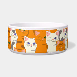 Witte en rode katten patroon groene ogen blauwe og voerbakje