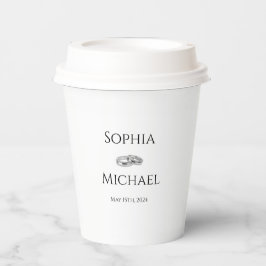 Witte en zwarte affaire-trouwringen- papieren bekers