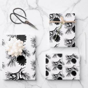 Witte en zwarte dennenspar tak en kegel inpakpapier vel