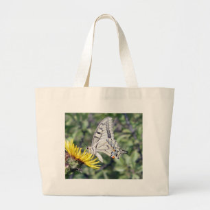 Witte en zwarte vlinder met rode vlekken grote tote bag