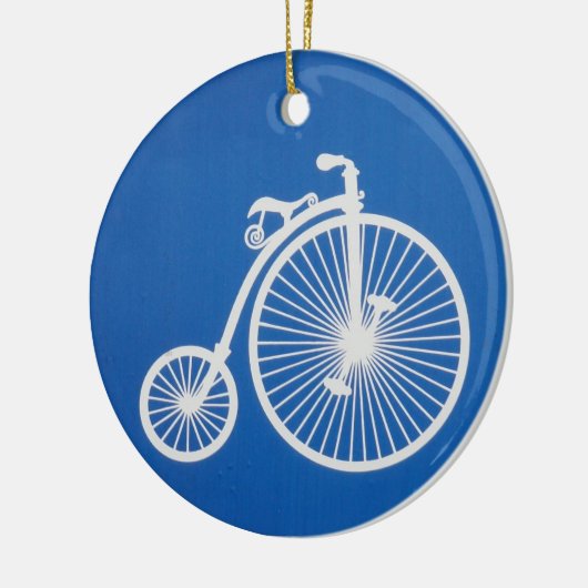  witte fiets op blauw keramisch ornament (Links)