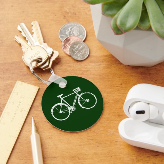 Witte fiets op groen sleutelhanger (Bureau)
