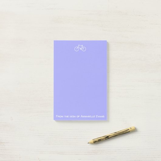 Witte fiets op Violet Post-it® Notes (Op bureau)