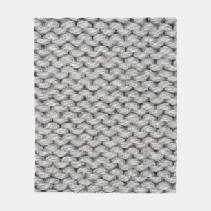 Witte gebreide woltextuur, close-up foto. fleece deken