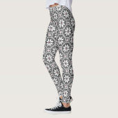 Witte geïsoleerde lace-structuur op zwarte achterg leggings (Links)