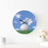 Witte golfbal in gras grote klok (Huis)