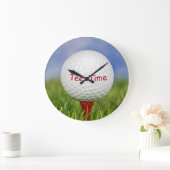 witte golfbal op rood t-shirt grote klok (Huis)