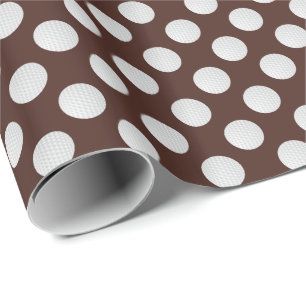 Witte golfballen op bruin cadeaupapier