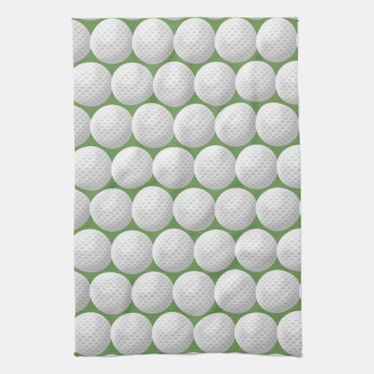 witte golfballen op groen theedoek (Verticaal)