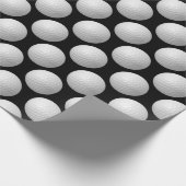 witte golfballen op zwart cadeaupapier (Hoek)