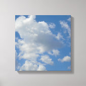 Witte/grijze wolken en blauwe hemel canvas afdruk (Voorkant)