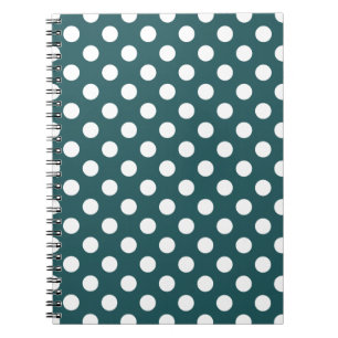 Witte haarpunten op blauwgroen notitieboek