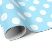 Witte haarpunten op bleek blauw cadeaupapier (Rol Hoek)