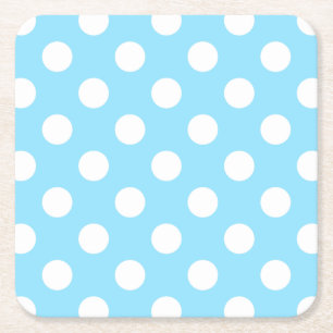 Witte haarpunten op bleek blauw kartonnen onderzetters