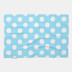 Witte haarpunten op bleek blauw theedoek