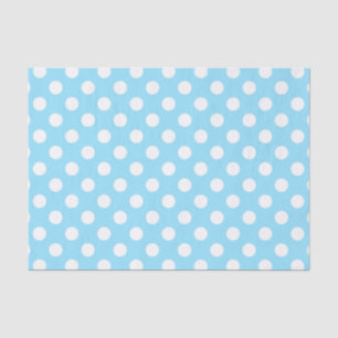 Witte haarpunten op bleek blauw tissuepapier