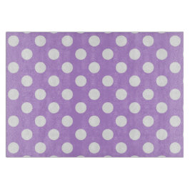 Witte haarpunten op lila snijplank