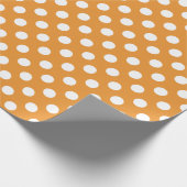 Witte haarvlekken op ambergeel cadeaupapier (Hoek)