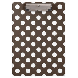 Witte haarvlekken op bruin klembord