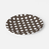 Witte haarvlekken op bruin papieren bordje (Gekanteld)