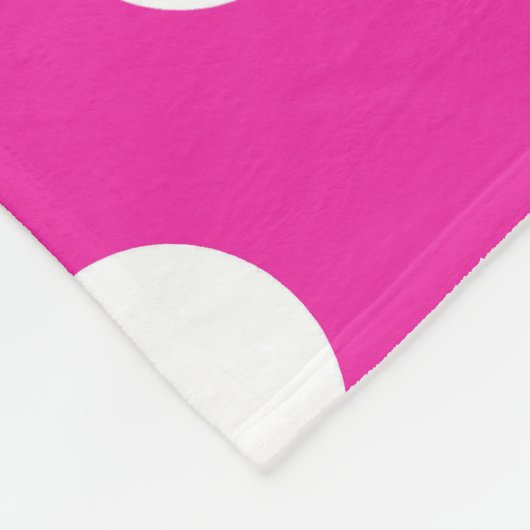 Witte haarvlekken op fuchsia fleece deken (Hoek)