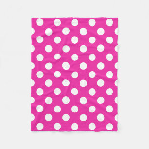 Witte haarvlekken op fuchsia fleece deken