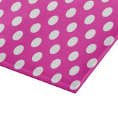 Witte haarvlekken op fuchsia snijplank (Hoek)