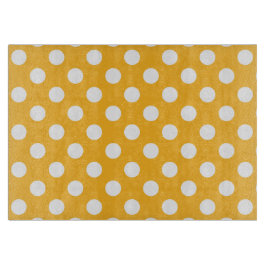 Witte haarvlekken op geel snijplank