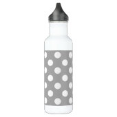 Witte haarvlekken op grijs waterfles  (Links)