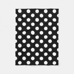 Witte haarvlekken op zwart fleece deken