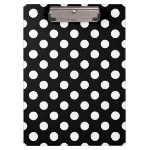 Witte haarvlekken op zwart klembord