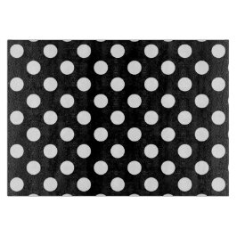 Witte haarvlekken op zwart snijplank