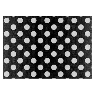 Witte haarvlekken op zwart snijplank