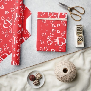 Witte harten op rode achtergrond cadeaupapier