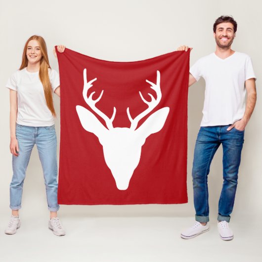Witte hertenkop silhouet op rood fleece deken (In situ)