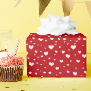 Witte hitte op rood cadeaupapier