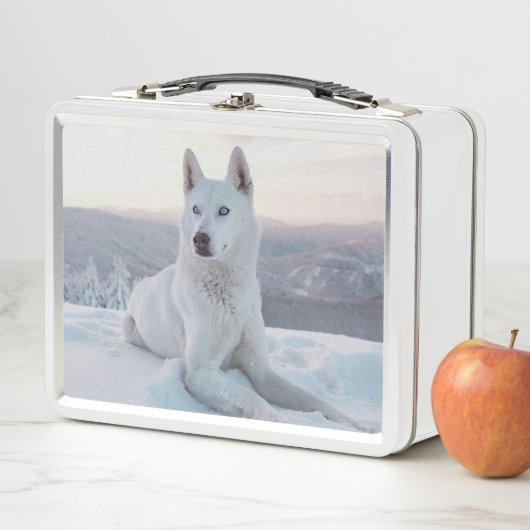 Witte hondje in de sneeuw (In situ)