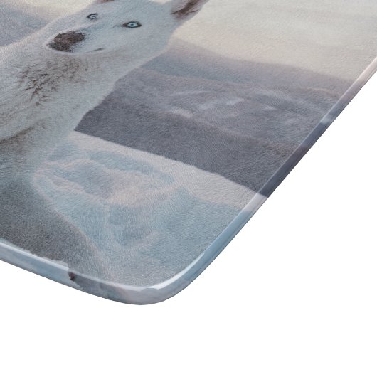 Witte hondje in de sneeuw snijplank (Hoek)