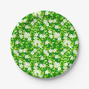 Witte jasmine uit groene bladeren papieren bordje