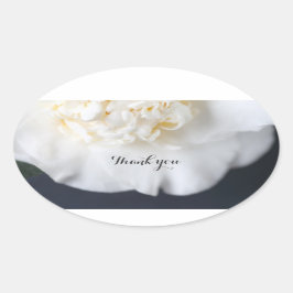 Witte kamellia op donkere achtergrond ovale sticker