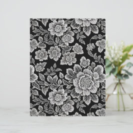 Witte kant bloemen op zwart