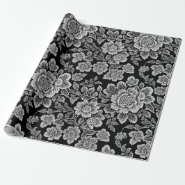 Witte kant bloemen op zwart cadeaupapier