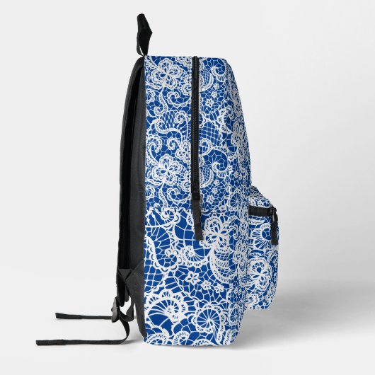 Witte kant op blauw bedrukte rugzak (Links)