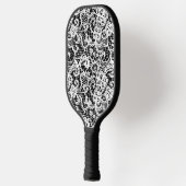 Witte kant op zwart pickleball paddle (Links)